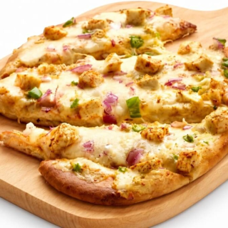 Shahi Paneer Naan Pizza Twist